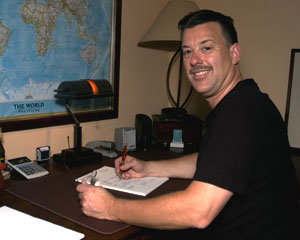 Bill at his desk